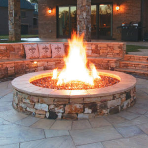 FireGear-20-crop Large exterior circular fireplace surrounded by seating.