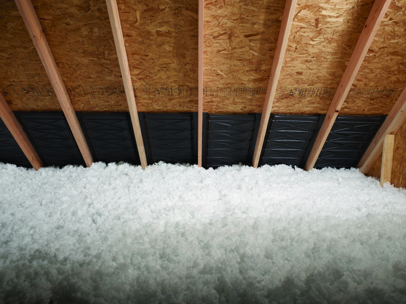 Blown-in insulation in an attic.