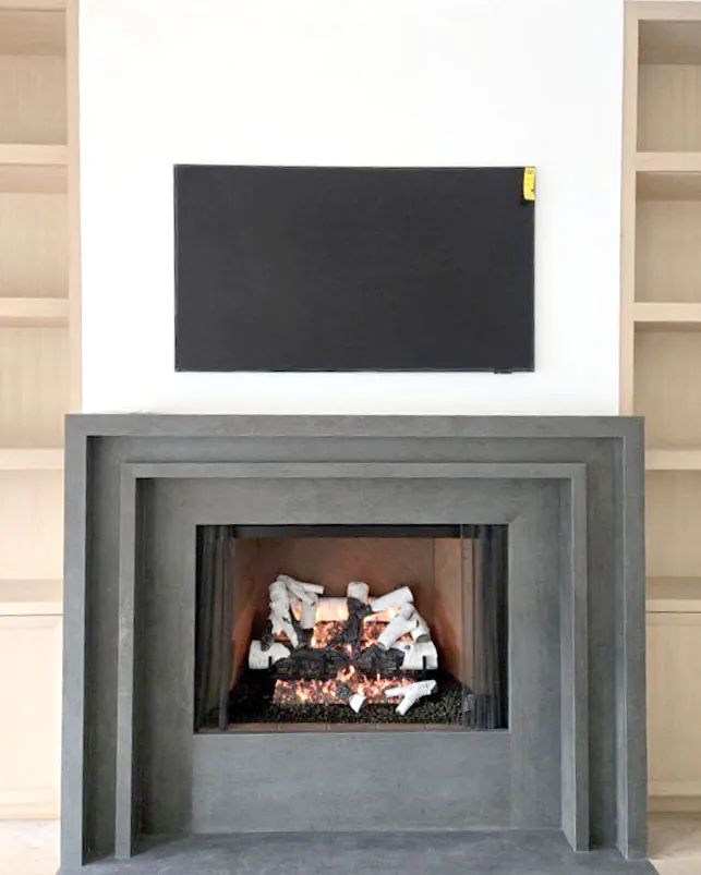 Grand Birch 30-inch 3-tier remote control gas log set burning in a modern living room. Grand Birch 30-inch 3-tier remote control gas log set burning in a modern living room.